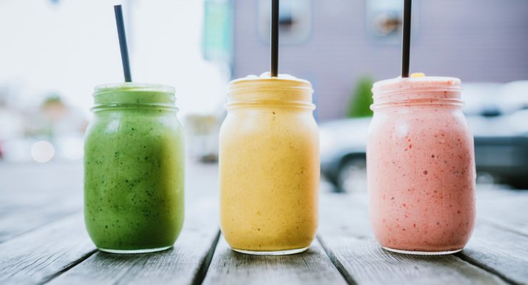 green, yellow and pink smoothies
